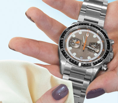 jewelry polishing cloth on stainless steel watch