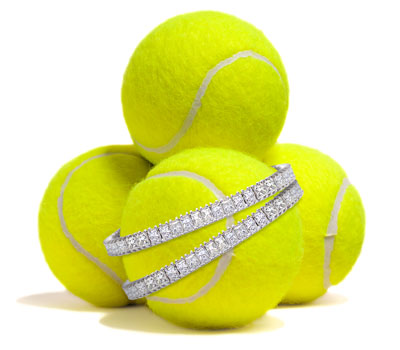 Tennis balls with a tennis bracelet