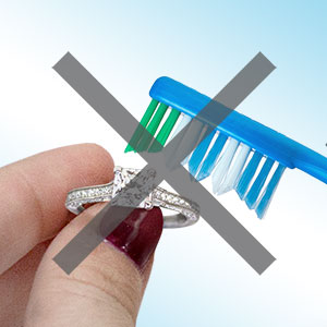 Cleaning jewelry with a toothbrush