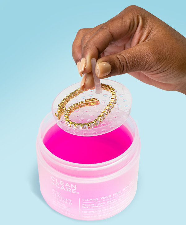 Bracelet being cleaned by Care + Care fine jewelry cleaner